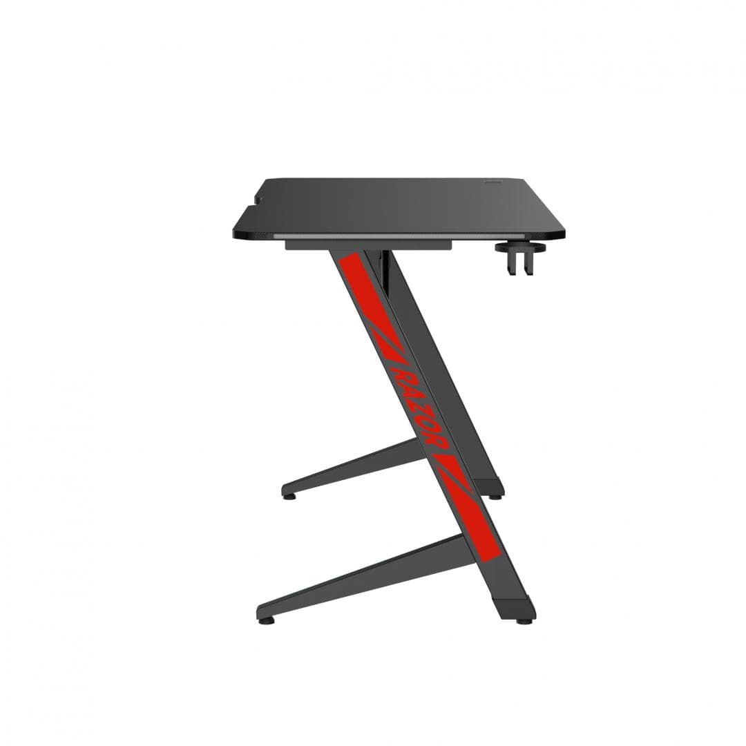 BIROU GAMING SERIOUX RAZOR  Material: MDF și melamină, plastic, oțel Dimensiuni 1200x600x750mm Dimensiuni blat (LxlxA) 1200x600x15mm Greutate suportata 75kg Iluminare ambientală LED cu gradient multicolor Culoare: Negru și negru mat, negru și roșu mat